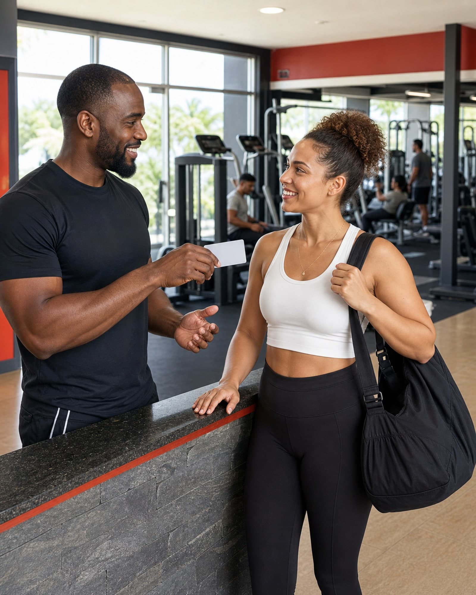 A Caribbean gym coach welcoming a new member at reception